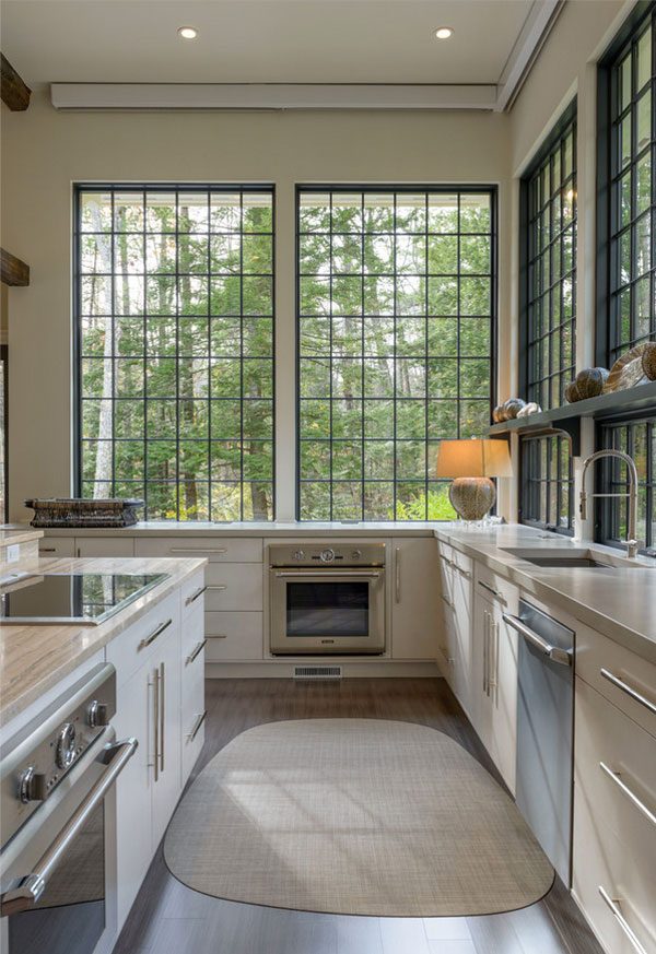 Kitchen with large grid windows.