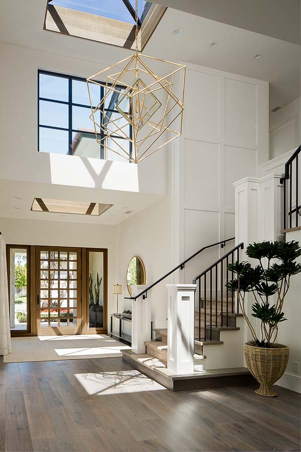 Two story entry way with large fixture.